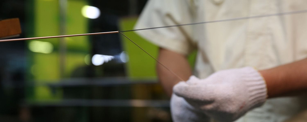 Acoustic Piano Strings Being Wound